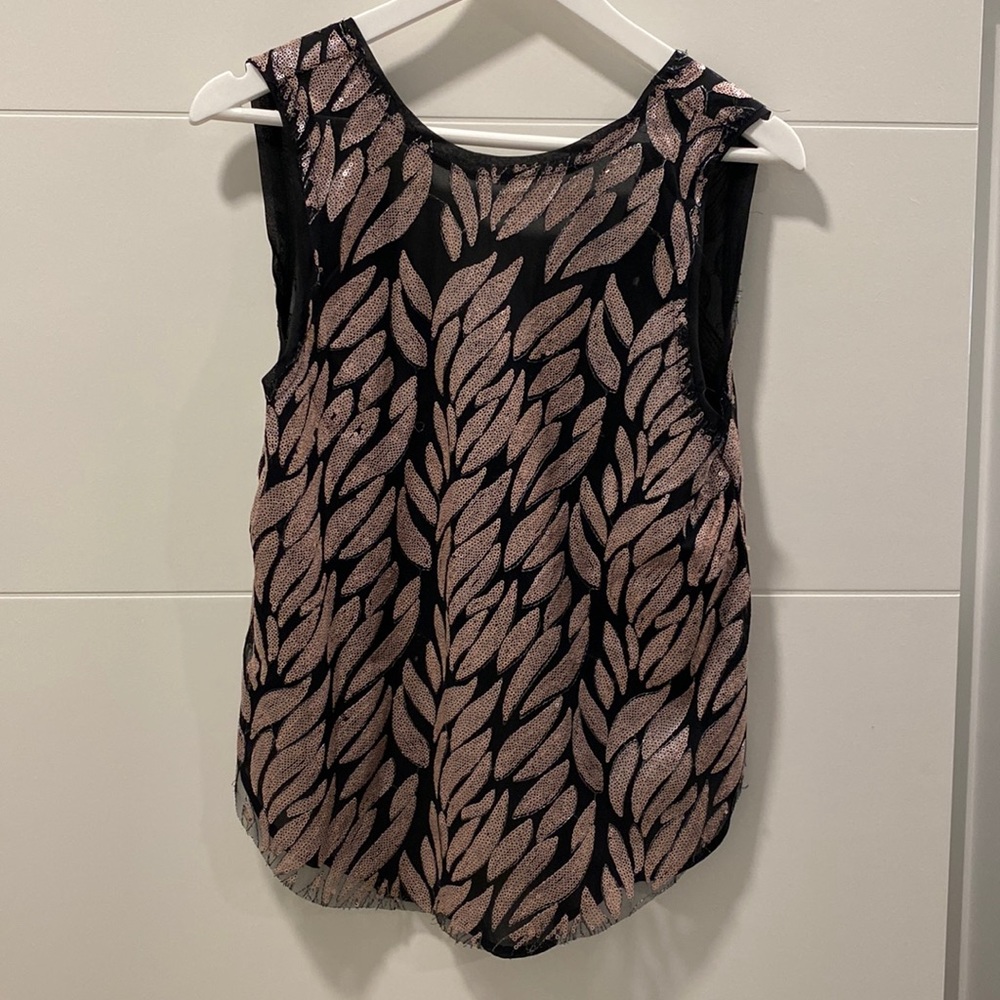 Anthropologie beaded top with raised back. Size S